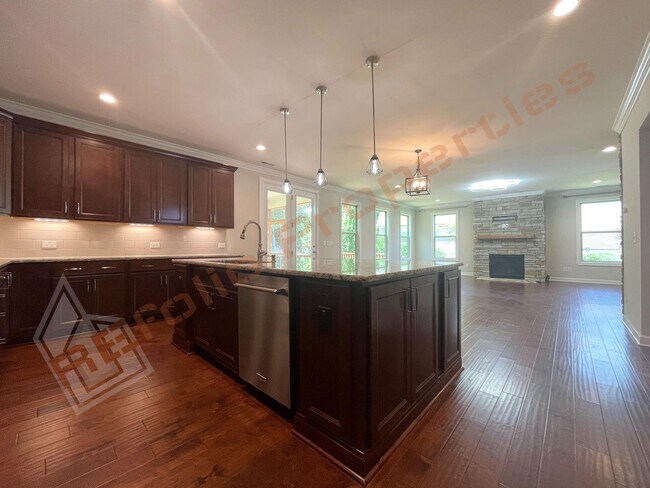 Building Photo - Gorgeous 5 Bedroom Home with First Floor In-law Suite & 3 Car Garage, Golf Course, Pool, Tennis a...