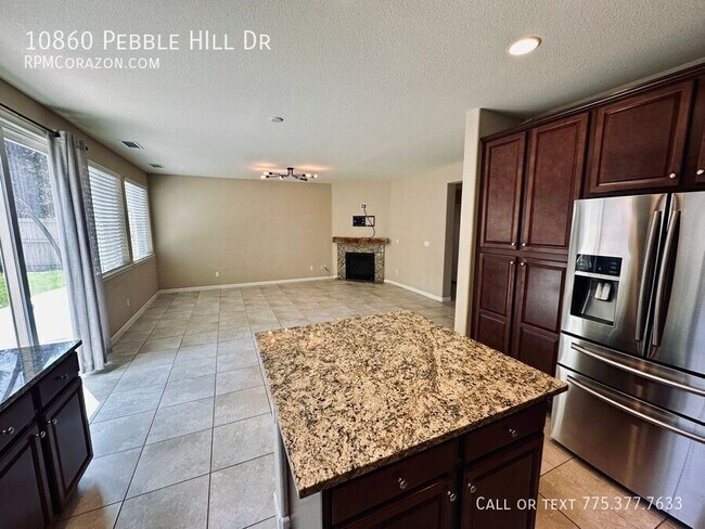 Building Photo - 10860 Pebble Hill Dr