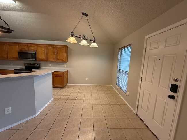 Building Photo - 7033 Snowy Owl St