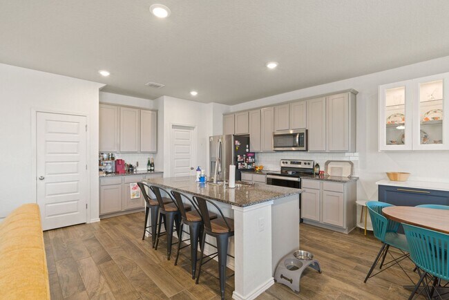 Building Photo - Stylish 4-Bedroom Home with Solar & Game R...