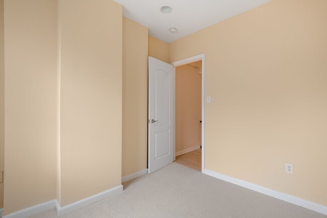 Building Photo - Spacious 2BR/2.5BA Townhome with Finished Basement & Extra Storage