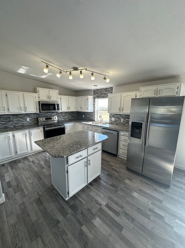 Building Photo - MODERN UPGRADES AND RURAL LIVING IN PEYTON