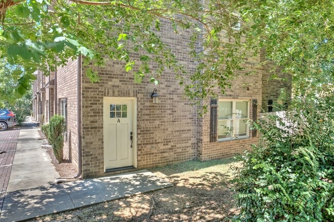 Building Photo - Heisman Villas: End Unit with Parking & Pr...