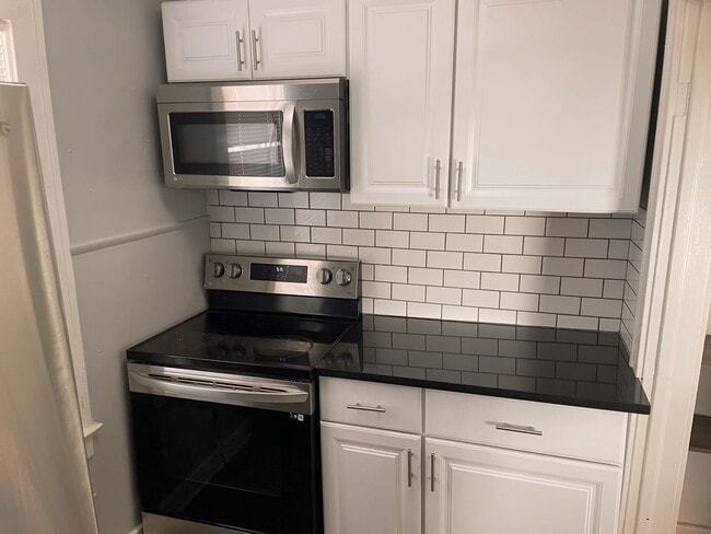Building Photo - 5817 Highland Ave