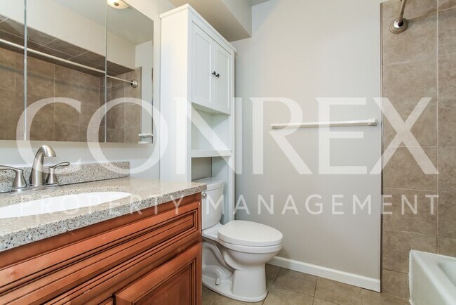 Building Photo - Spacious and Newly Renovated