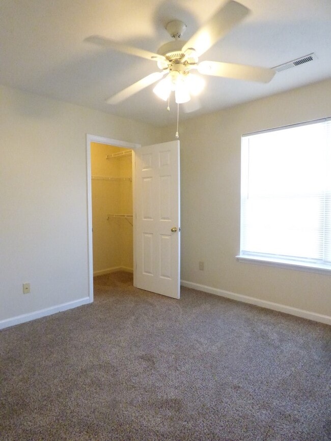 Building Photo - COMING SOON! Spacious Townhouse, W/D Hookups, Off-Street Parking, All Electric!