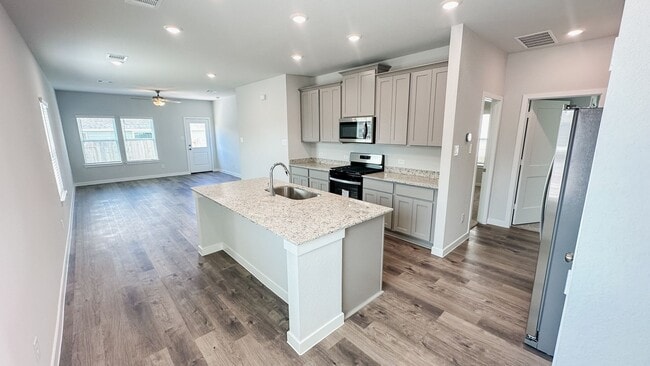 Building Photo - Brand new! Modern 3-Bedroom with Open-Conc...
