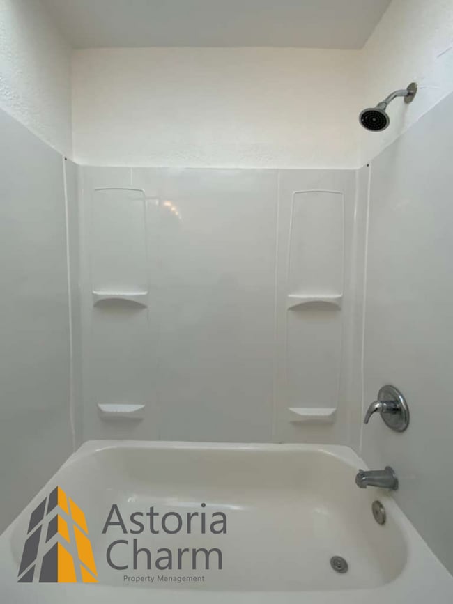 Building Photo - 3 Bed with Finished Basement, Skylight Bath, and Private Yard