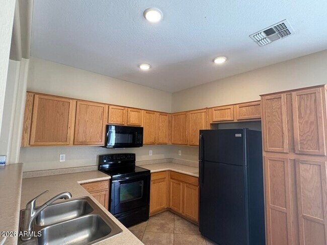 Building Photo - 15337 W Port Au Prince Ln