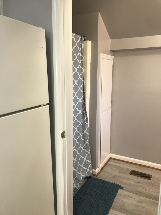 Kitchen looking into 2nd bathroom - 3226 Park Ave