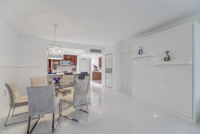 Building Photo - 10275 Collins Ave