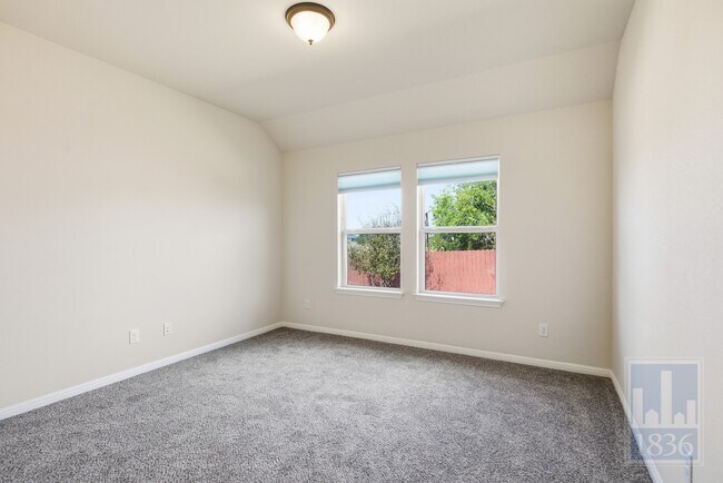 Building Photo - 8336 Paola St