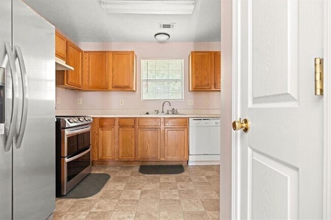 Building Photo - 5696 Windfall Ln