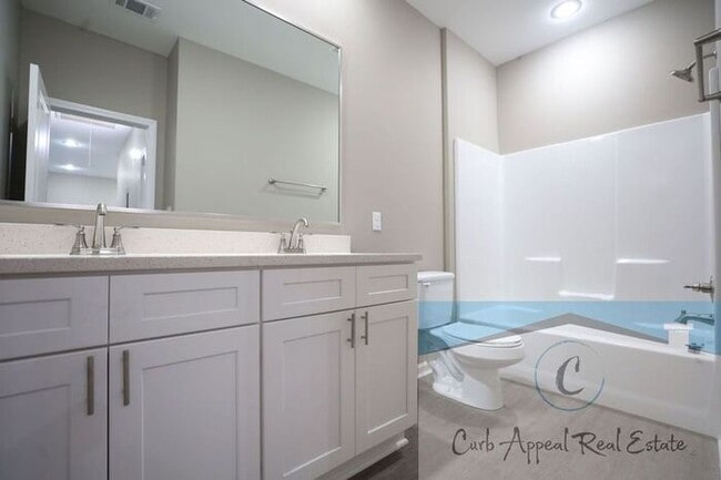 Building Photo - Luxury 2 bed 1 bath apartment - brand new construction!! Washer, dryer and utilities included!!