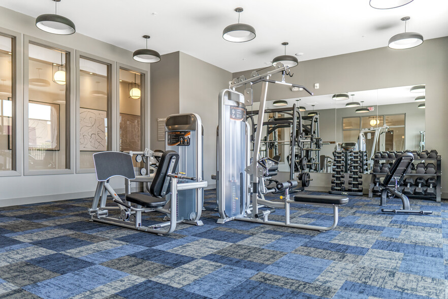 Weight Room - Fitness Center - The Falls at Pike Creek Apartments