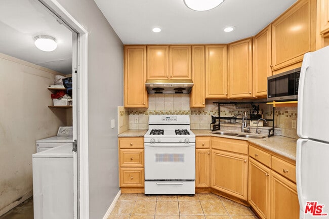 Building Photo - 16711 Mapes Ave