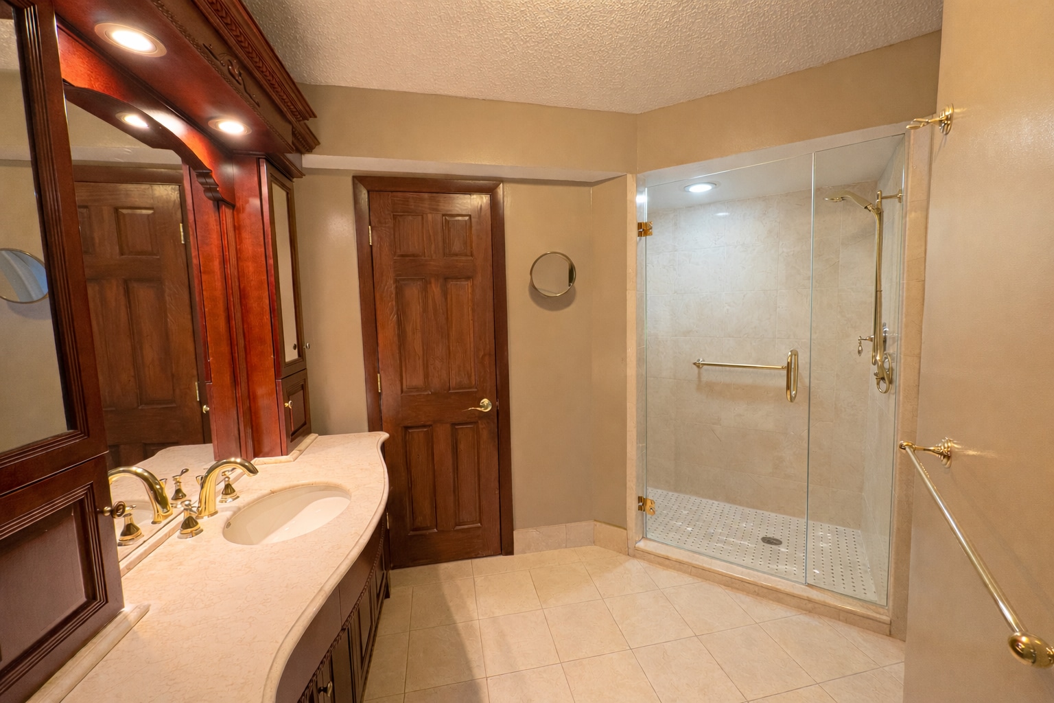 Marble walk-in shower with frameless glass enclosure. - 25 Rockledge Ave