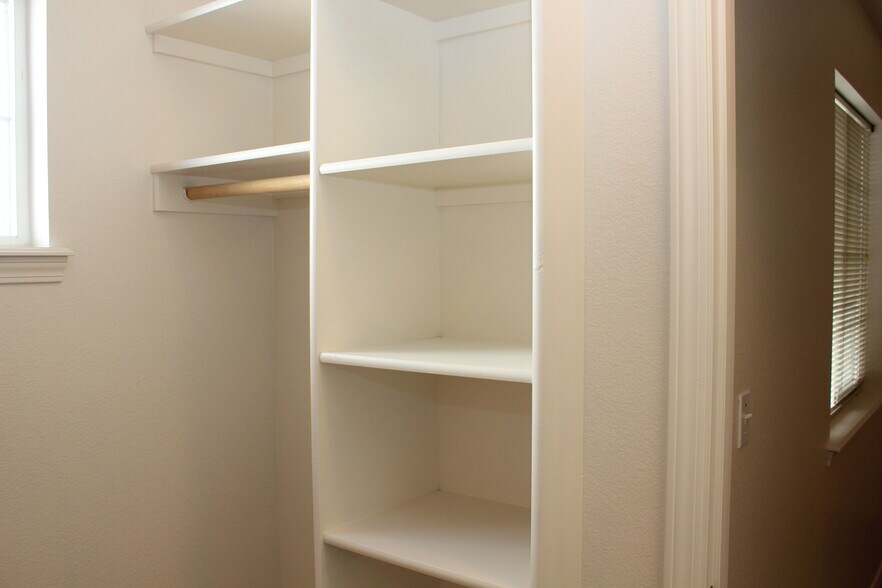 Guest Walk-in closet with Shelves - 7626 W Opohonga Ln
