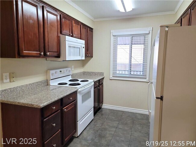 Building Photo - Adorable unit in Bella Vita community!