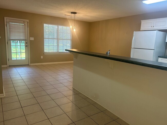 Building Photo - Prime Location * Evans Home * Screened Porch