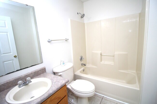 Building Photo - 3BR/2BA North Pensacola Brick Home with Bonus Room, Vaulted Ceilings & Privacy-Fenced Backyard Ne...