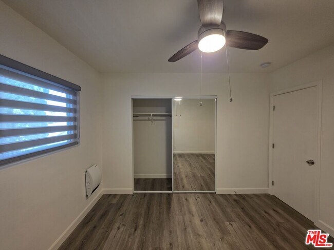 Building Photo - 10734 Palms Blvd