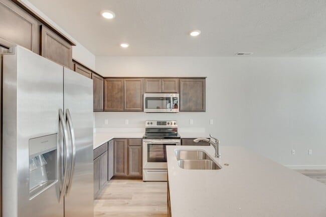 Building Photo - Love where you live! Townhome Available!