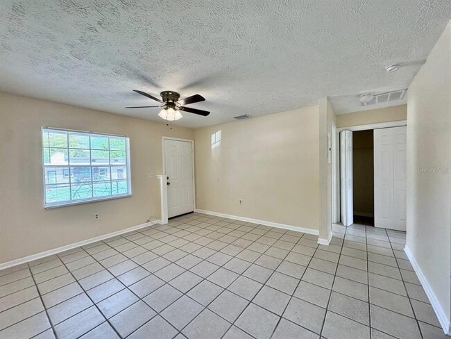 Building Photo - 10015 N Aster Ave