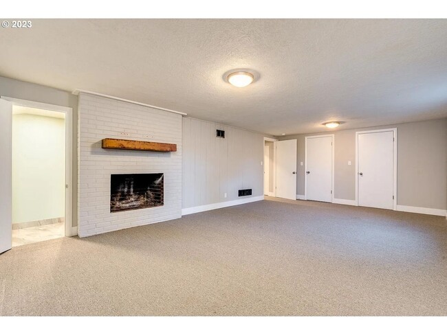 Building Photo - Stylishly Updated Mid-Century Gem on a Qui...
