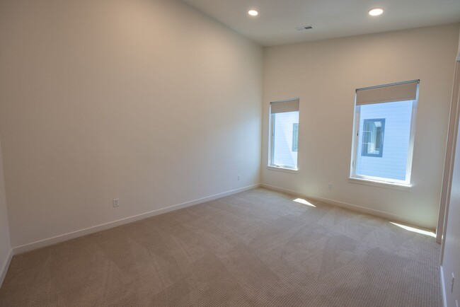 Building Photo - Riverside Townhomes - Waterfront Living in...