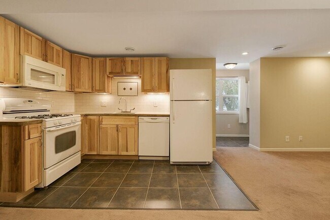Kitchen - Subway Tile + Underlit Cabinets - 6400 Hampshire Pl N