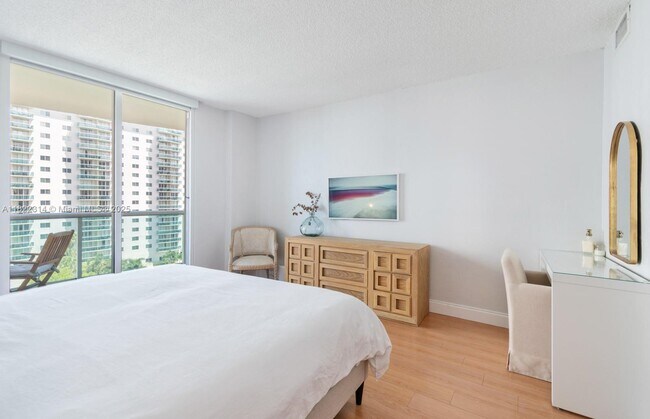 Building Photo - 19390 Collins Ave