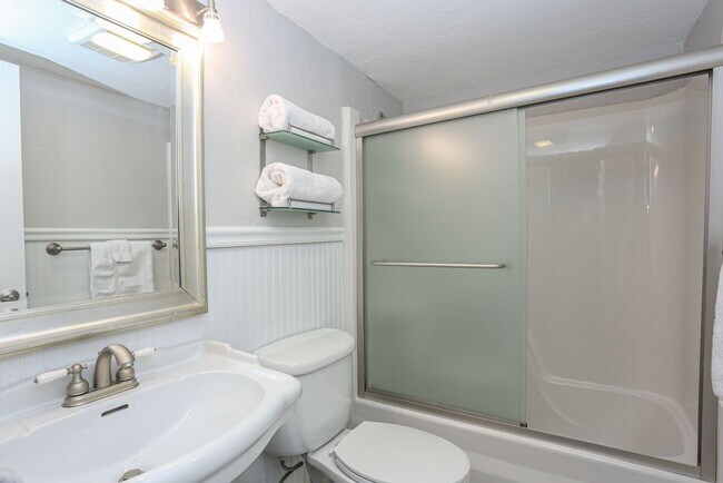 Building Photo - Walk to everything! Partially Furnished! Flexible lease terms!