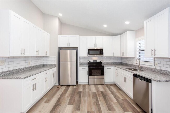 Building Photo - 4049 Leicester Dr NE