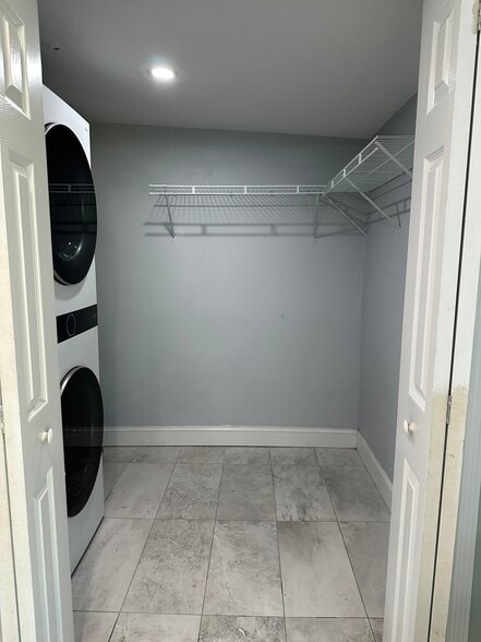 laundry and master walk in closet - 5932 McKee Lake Dr N