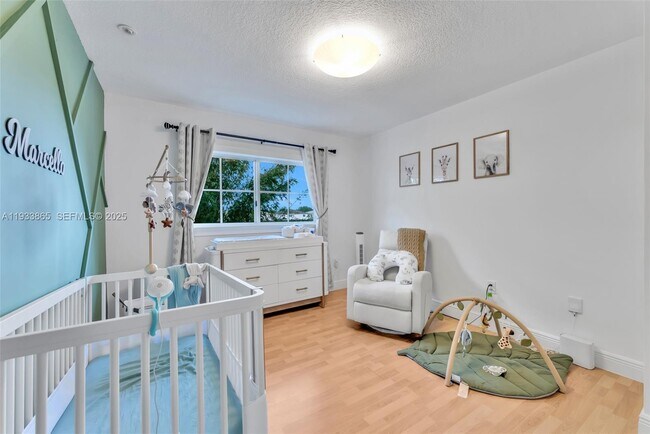 Building Photo - 12925 SW 49th Ct