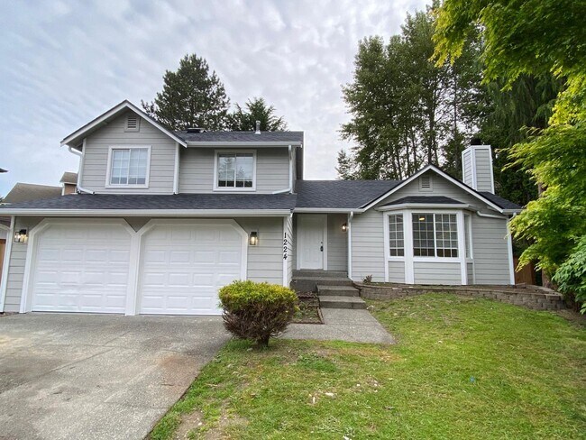 Building Photo - Stylishly Renovated Home with Private Back...