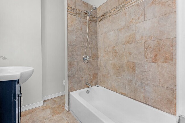 Building Photo - Charming Updated Rowhome in Belair-Edison – Move-In Ready!