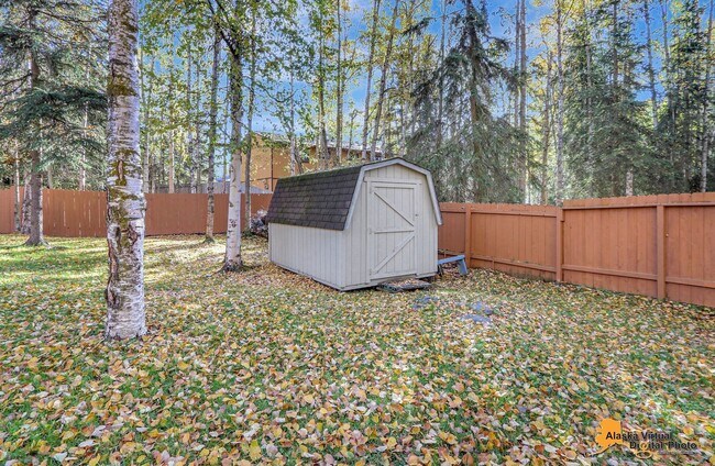 Building Photo - Eagle River Home w/ Fenced Yard, Sunroom, and Garage!