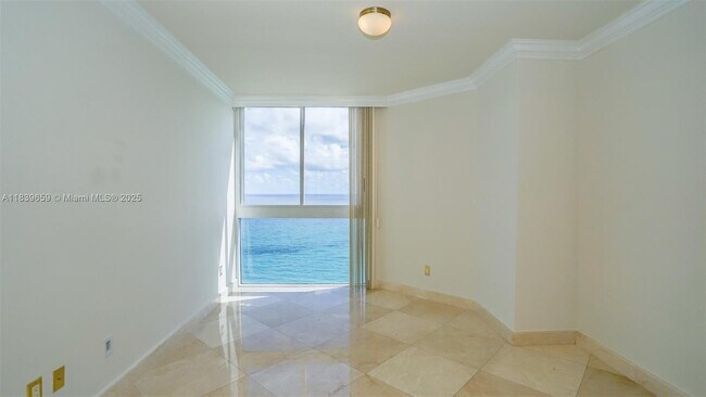 Building Photo - 4779 Collins Ave