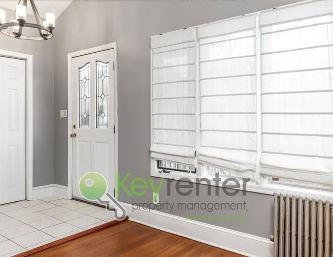 Building Photo - Spacious 3-Bed, 2-Bath Nutley Home with Bonus Office, Multi-Level Deck & Quiet Location