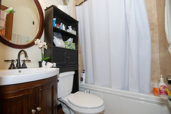 Building Photo - Central Mission Hill Location. Steps from the T Stop. In-Unit Washer and Dryer. Recently Renovate...