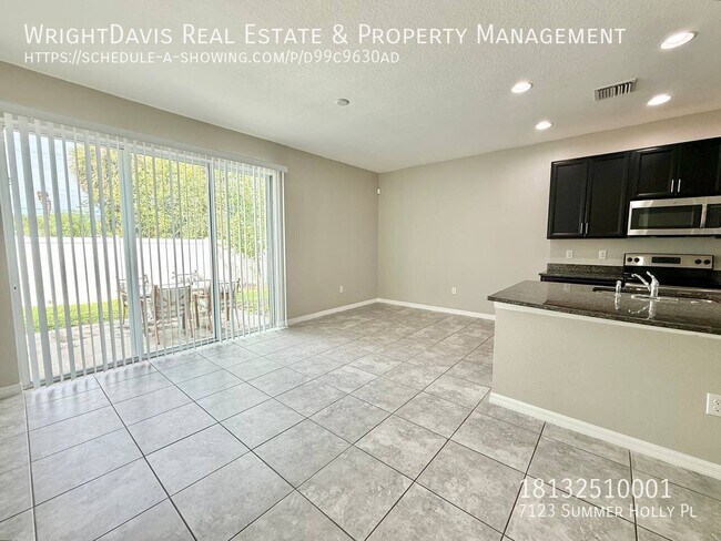 Building Photo - 7123 Summer Holly Pl
