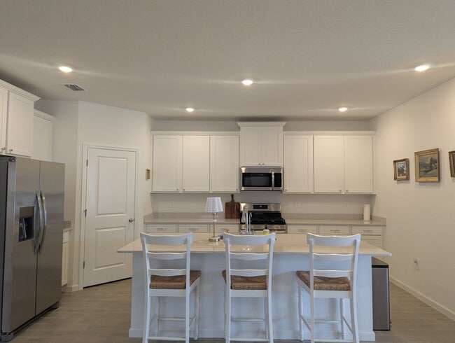 Building Photo - Beautiful newer-construction 4-bedroom, 3-bath home located in Trailhead Landing
