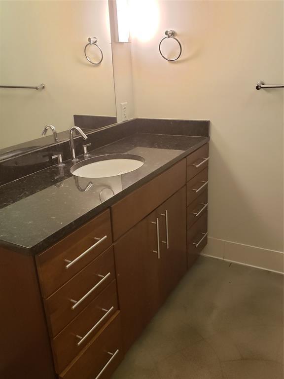 Vanity offers lots of counter space and storage - 800 Brazos St