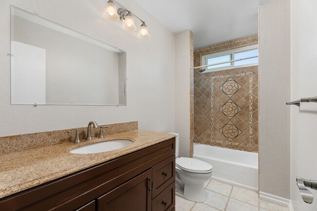 Building Photo - Coastal Elegance Meets Family Comfort in D...