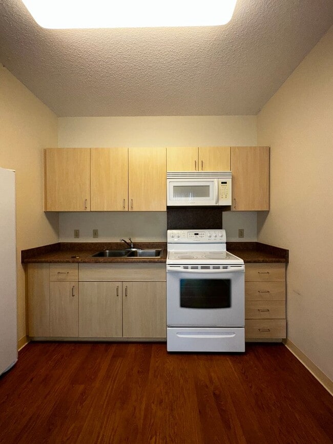 Building Photo - Plantation Town Apartments - Paiwa Tower 1...