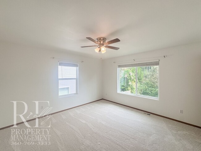 Building Photo - Spacious 4-Bedroom Home with Brand-New Carpet, Two Living Areas & Loft