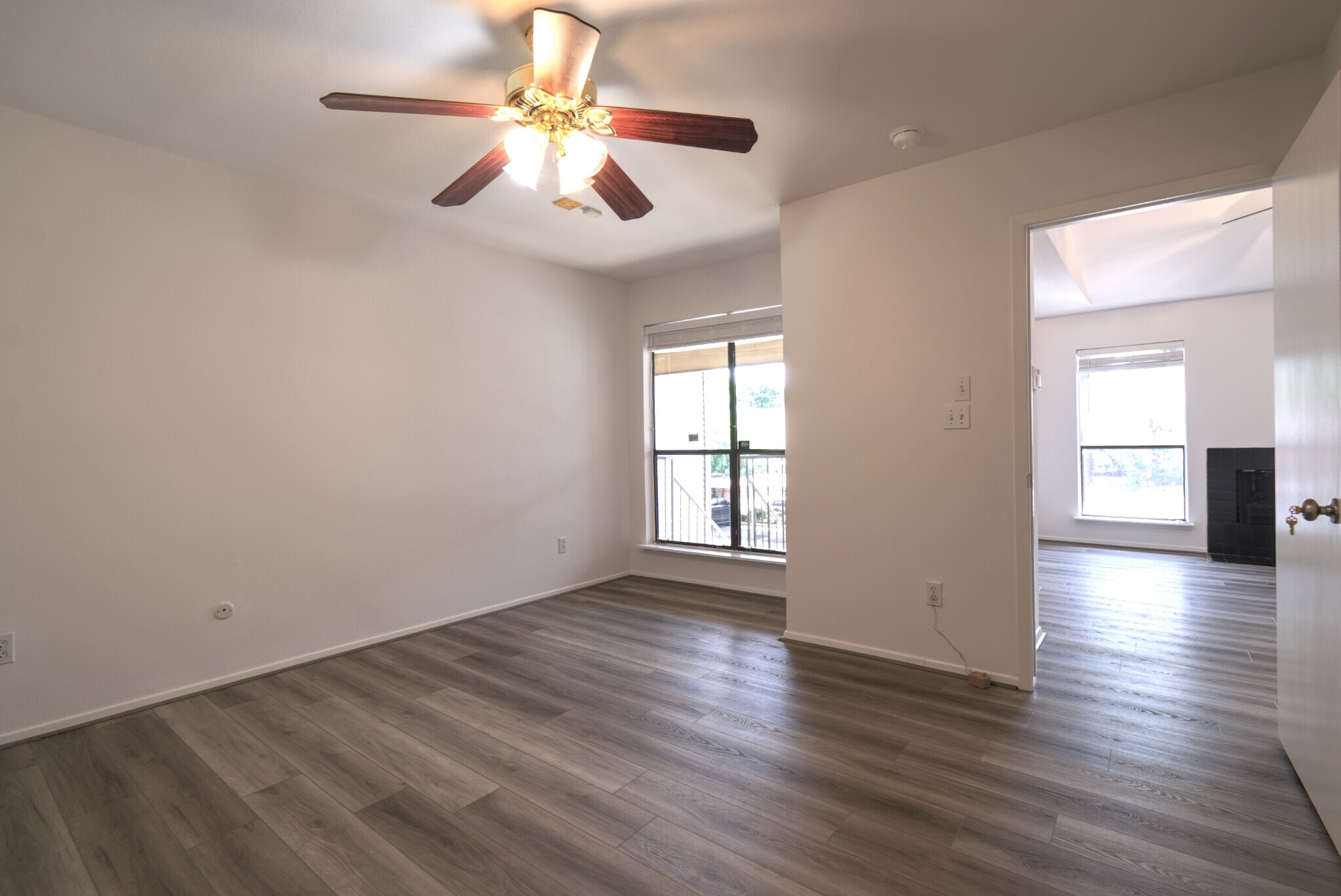 Secondary Bedroom, seen from the northeast corner, featuring a window that faces South. With its pos - 2025 Augusta Dr