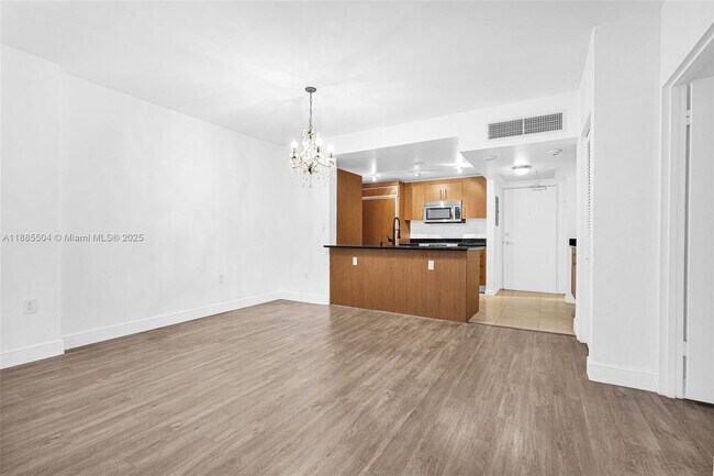 Building Photo - 10275 Collins Ave